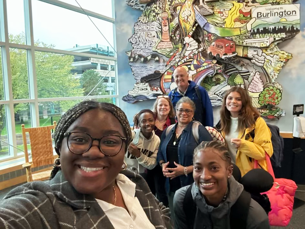 Jerry Johnson and Yolanda Dunston pose with student researchers in Vermont.