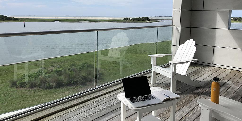 A calm outdoor scene with a balcony