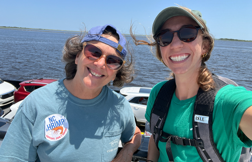 Barbara Garrity-Blake and Dana Grieco on a boat.