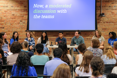 A panel of students faces the audience at the Story+ symposium.